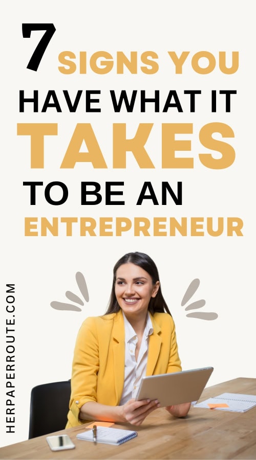 smiling businesswoman thinking about what it takes to be an entrepreneur