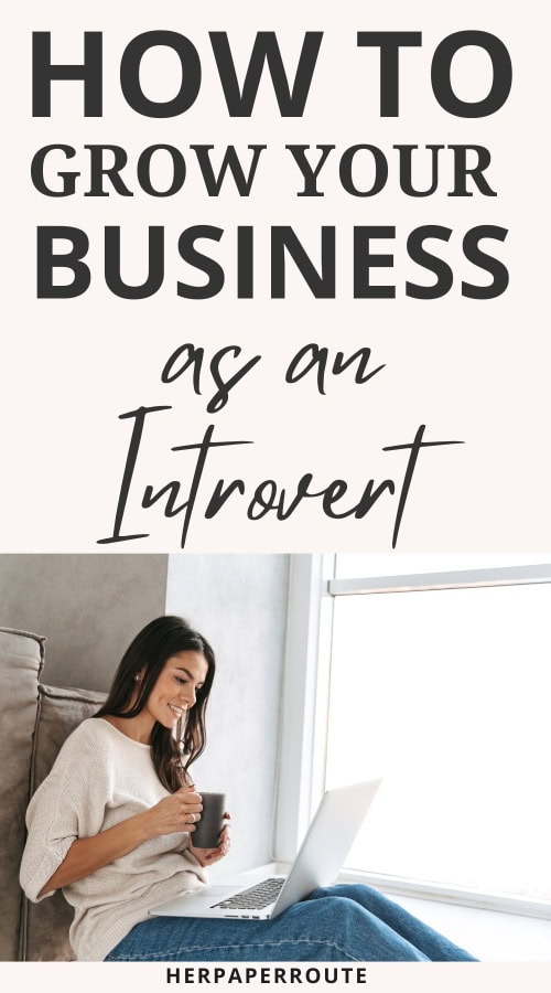 female entrepreneur working from her living room demonstrating how to grow your business as an introvert