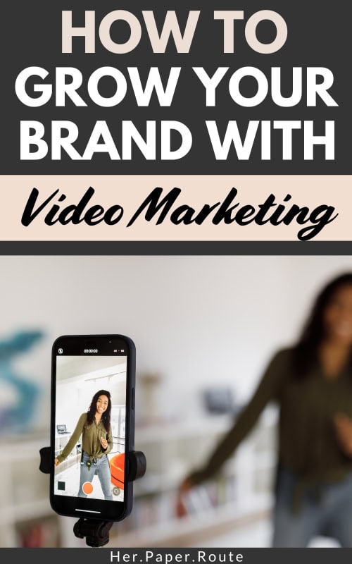 cell phone on tripod filming a woman doing video marketing