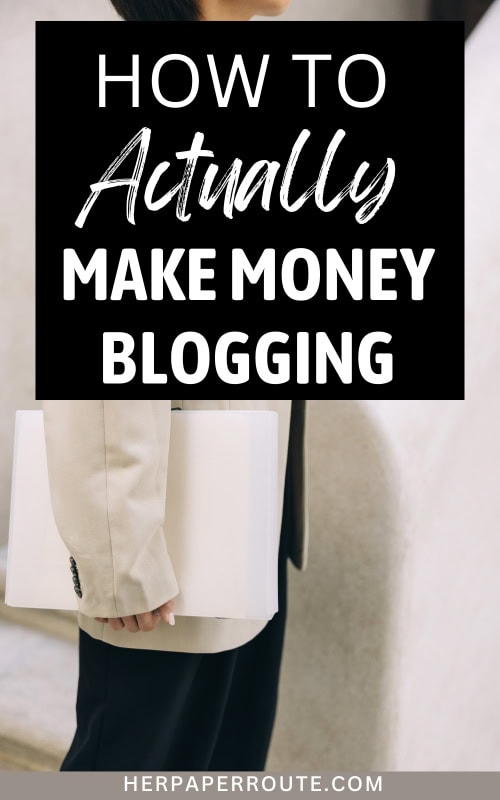 entrepreneur holding laptop learning how to actually make money blogging