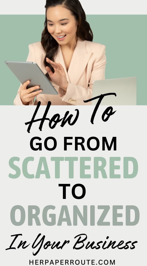 business owner on tablet excited at changing from scattered solopreneur to organized ceo