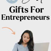hard-working businesswoman with laptop showing the best gifts for entrepreneurs
