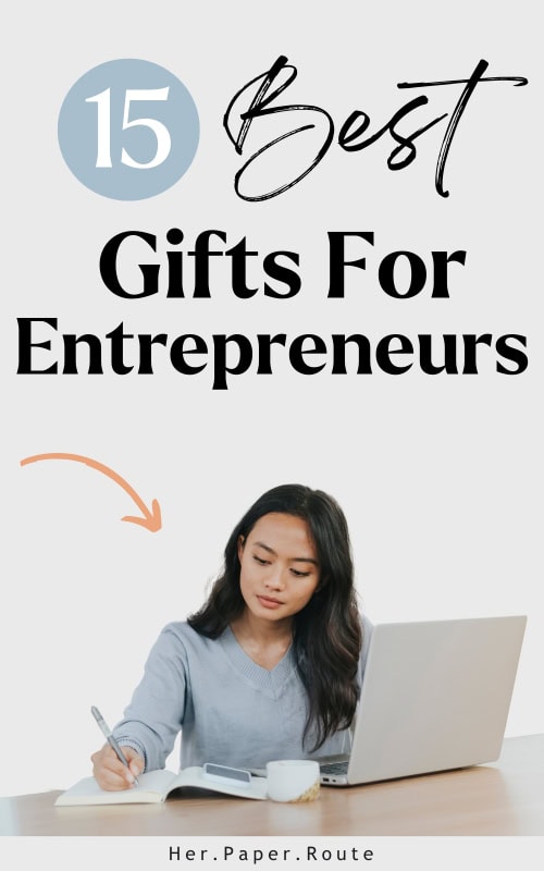 hard-working businesswoman with laptop showing the best gifts for entrepreneurs