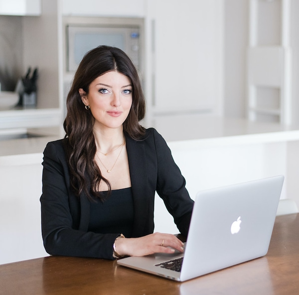 Chelsea Clarke at desk, planning monthly CEO day 