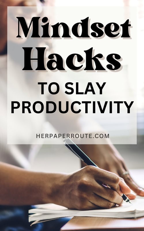 entrepreneur writing in notebook and implementing mindset hacks to slay productivity