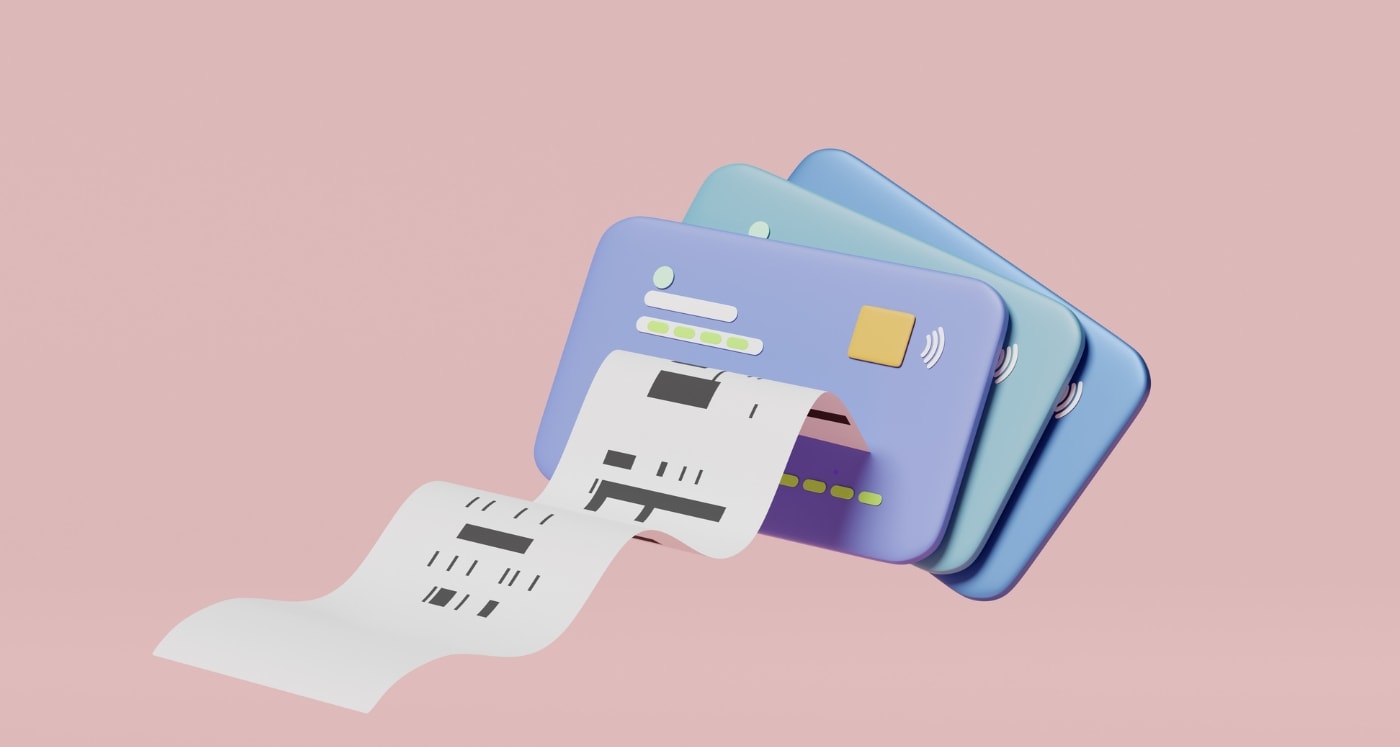 debot cards on a pink background with receipt asking When You Get A New Debit Card Does The Card Number Change?