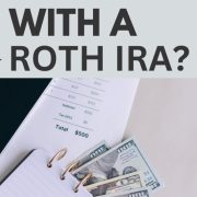 dollar bills and notebook showing calculations and answering the question can you lose money in a Roth IRA