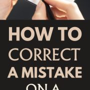 woman writing showing how to correct a mistake on a check
