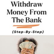 woman with handful of dollar bills showing how to withdraw money from bank