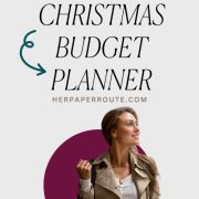 woman smiling with shopping bags after saving money using her christmas budget planner
