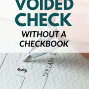 person signing check showing how to get a voided check