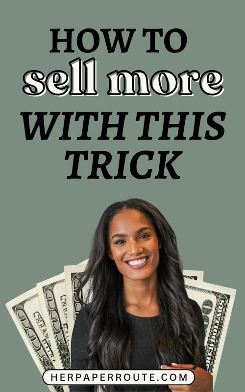 smiling entrepreneur with money behind her showing the result of learning to sell more
