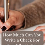 woman writing a check answering the question how much can you write a check for