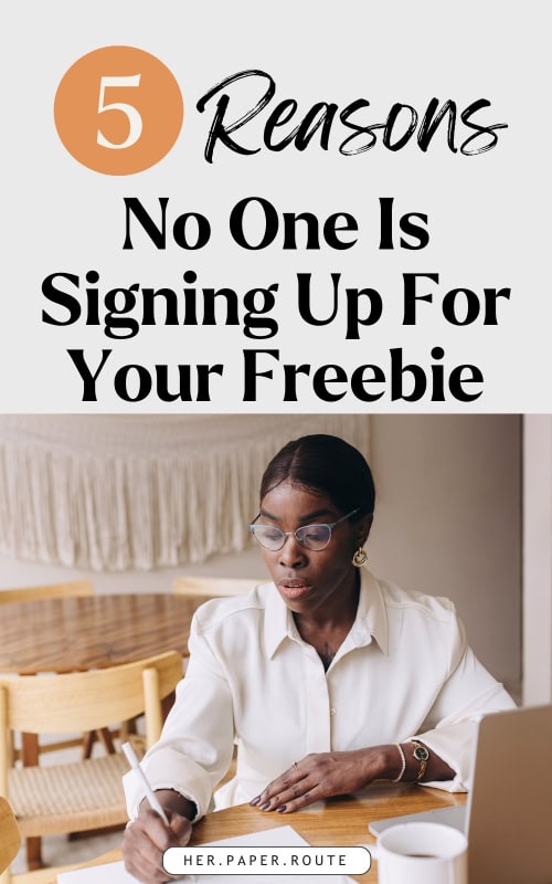 business owner writing down why no one is signing up for your freebie