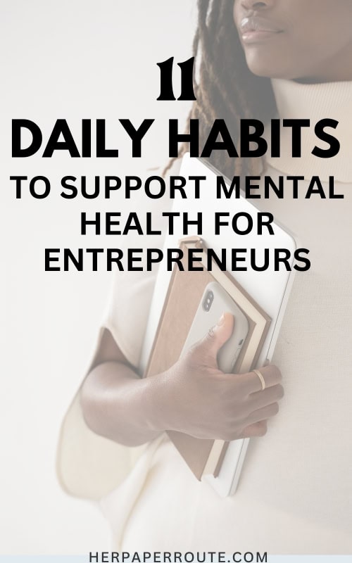 business owner with phone and notebook learning the best habits for mental health for entrepreneurs