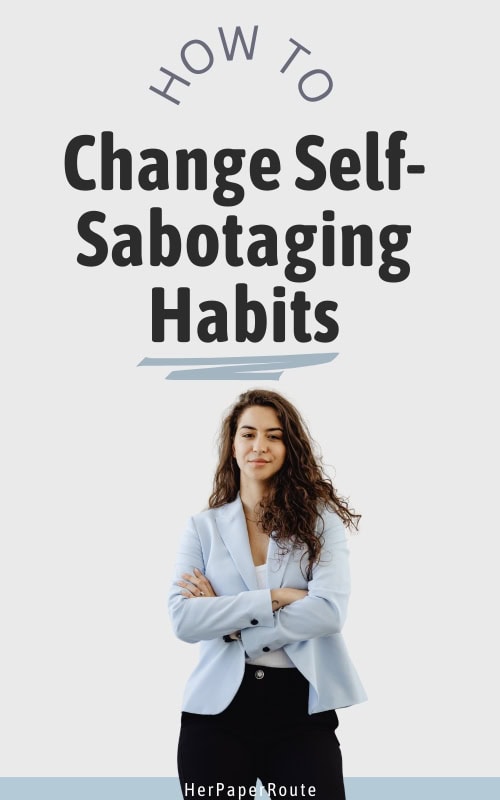 confident woman standing with arms crossed demonstrating how to change self-sabotaging habits