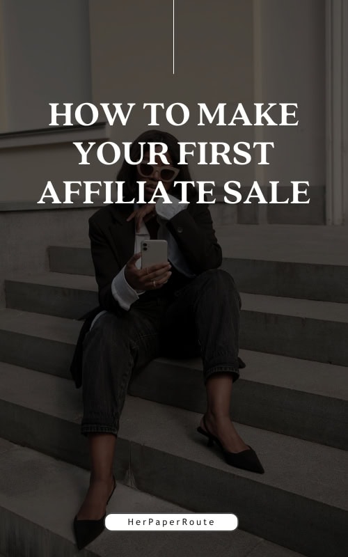 content creator on phone learning how to make your first affiliate sale