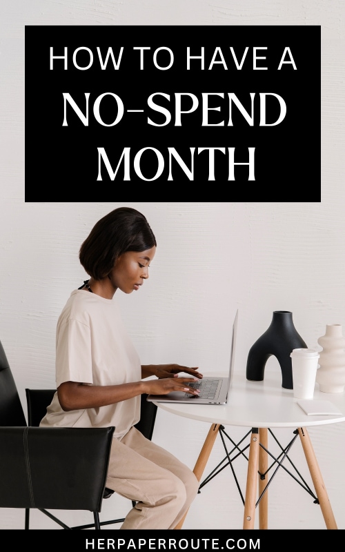 woman budgeting on her laptop figuring out how to have a no-spend month