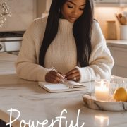 beautiful woman writes in her journal as she practices Powerful list of positive New Year affirmations to manifest her dream life