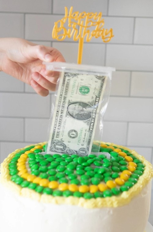 hidden money dispenser for birthday cake holder